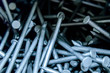 pile of silver construction nails