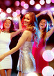 © Syda Productions - three smiling women dancing in the club