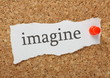 © thinglass - The word imagine on a cork notice board