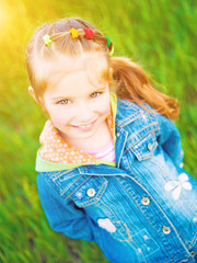 little girl on the meadow