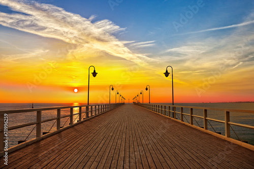Fototapeta na wymiar Sunrise at the pier in Orlowo, Poland.
