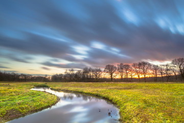 Wall Mural - Long Exposure Sunset over River Landscape