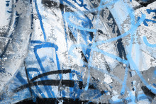 Abstract Blue Graffiti Fragment On Gray Urban Concrete Wall