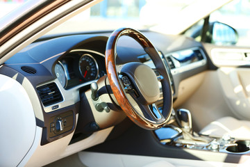 Wall Mural - Interior view of car with beige salon and black dashboard