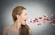 © pathdoc - woman sending kisses, red hearts coming out of open mouth