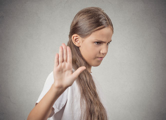 grumpy teenager girl giving talk to hand gesture