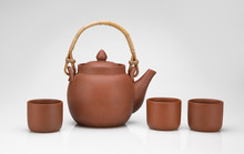 Clay Teapot With Three Cups, Isolated On White Background