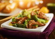 chinese beef and broccoli  stir fry bathed in warm glow