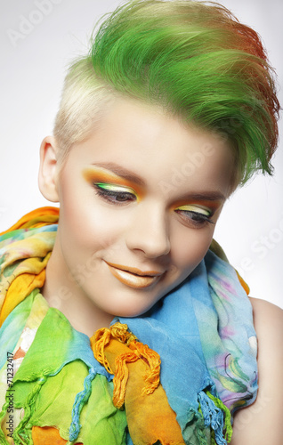 Naklejka ścienna Young Woman with Colorful Makeup and Short Painted Coiffure