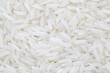 © torsakarin - Asian white rice or uncooked white rice