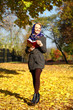 © Andrey_Arkusha - Young woman walking on a beautiful fall day