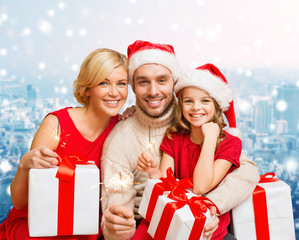 Sticker - happy family in santa helper hats with gift boxes