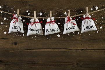 Wooden christmas background: greeting card with presents and tex