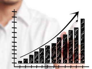 Man hand drawing a chart