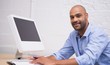 © WavebreakMediaMicro - Businessman using computer at desk