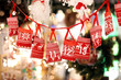 Small bags as Advent calendar with Sweets surprises hanging on a
