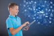 © V&P Photo Studio - young boy using tablet,school learning or technology concept
