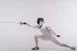 © Viacheslav Yakobchuk - Young woman engaging in fencing