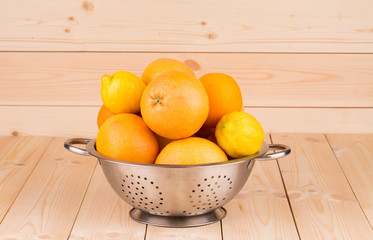 Wall Mural - Grapefruits and lemons in a bowl