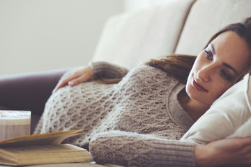 Home portrait of pregnant woman