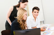 © W PRODUCTION - young people business team working together in a meeting room