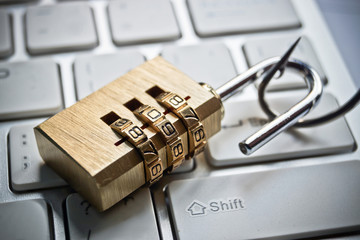 Wall Mural - security lock on computer keyboard with a fish hook