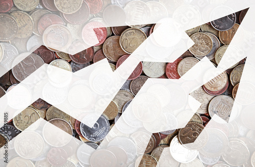 Fotografía Different countries coins background with growing trends arrows
