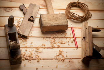 carpenter tools in pine wood table