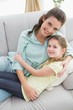 © WavebreakmediaMicro - Cute mother and daughter on the couch