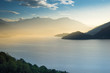 First sunrays over Lake Como looking from Italy into Switzerland