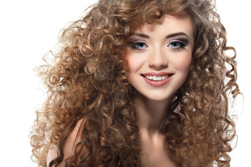 Young beautiful woman with long curly hairs