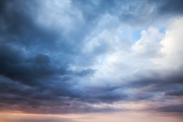 dark blue stormy cloudy sky. natural photo background