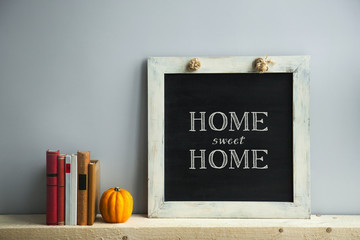 Wall Mural - chalkboard frame with books and pumpkin HOME SWEET HOME