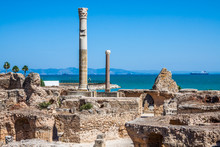 Ancient Ruins At Carthage, Tunisia With The Mediterranean Sea In