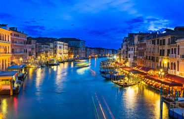 Wall Mural - Night view of Grand Canal with gondolas in Venice. Italy