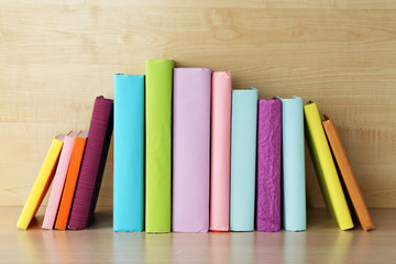 Poster - Books on wooden shelf close-up