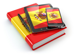 Wall Mural - Spanish learning. Mobile devices, smartphone, tablet pc and book