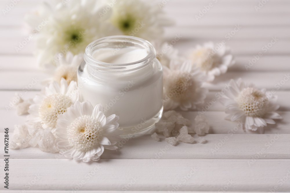 Skin cream on wooden table