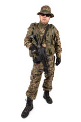 Soldier with rifle on a white background