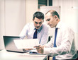 © Syda Productions - two businessmen having discussion in office