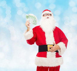 Canvas Print - man in costume of santa claus with euro money