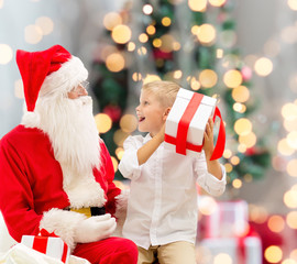 Sticker - smiling little boy with santa claus and gifts