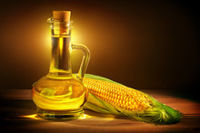 Bottle With Oil And A Corncob.