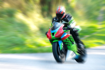 Wall Mural - Motorcyclist in motion