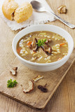 Fototapeta Na sufit - Homemade vegetarian mushroom soup with barley and vegetables