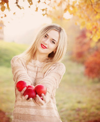 Girl with the apple outdoor