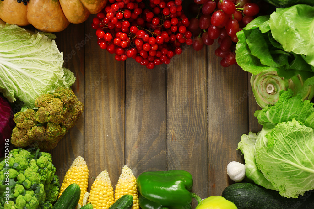 Fresh organic vegetables on wooden table, close up