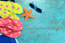 Summer Background With Flip-flops, Sunglasses And Starfish