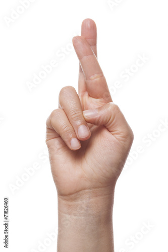 Cuadros en Lienzo Hand isolated on white background with fingers crossed