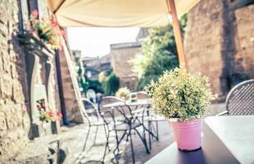 Cafe in old street in Europe with retro vintage look